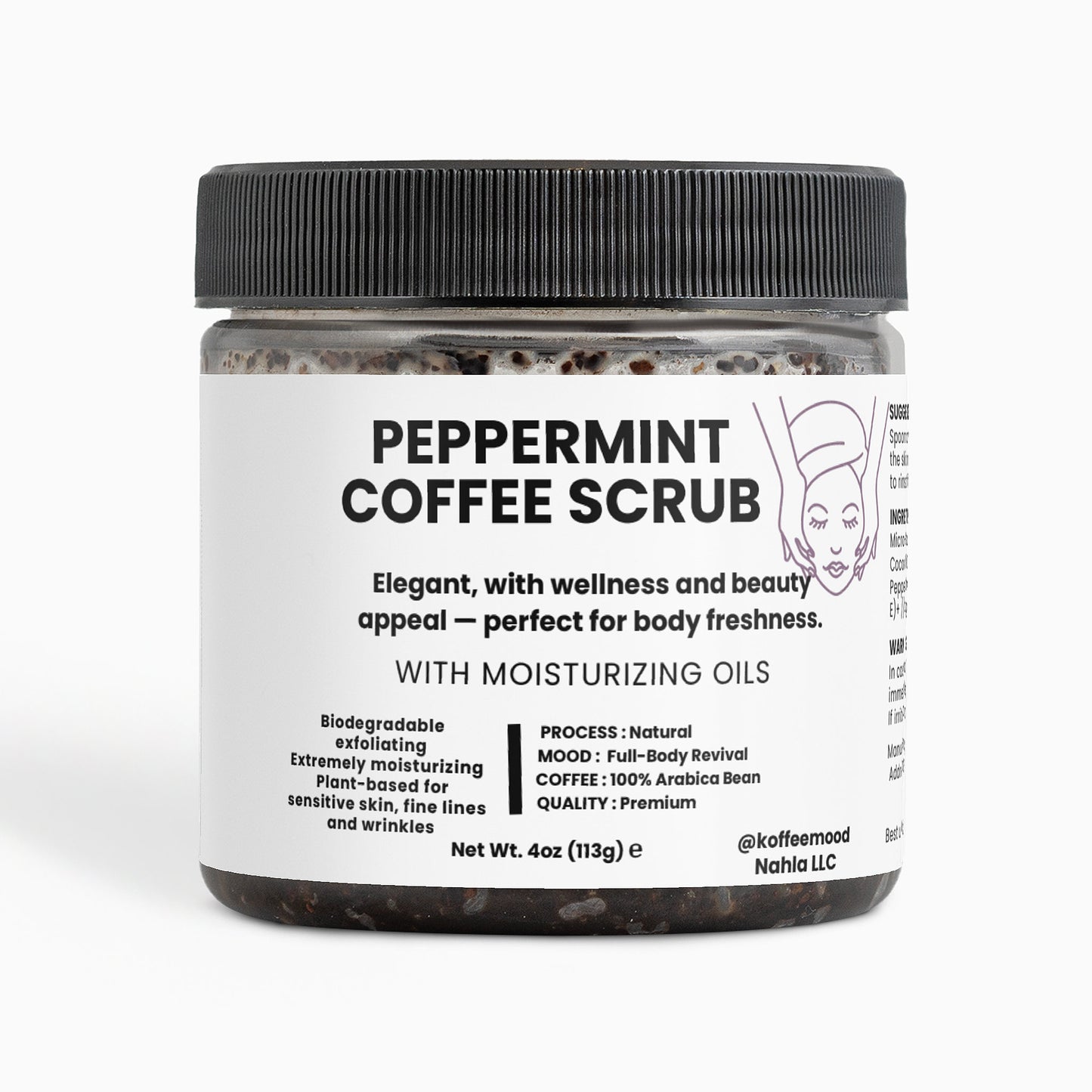 Peppermint Coffee Scrub beside fresh mint leaves – energizing body exfoliant made with Arabica coffee and essential oils for glowing skin